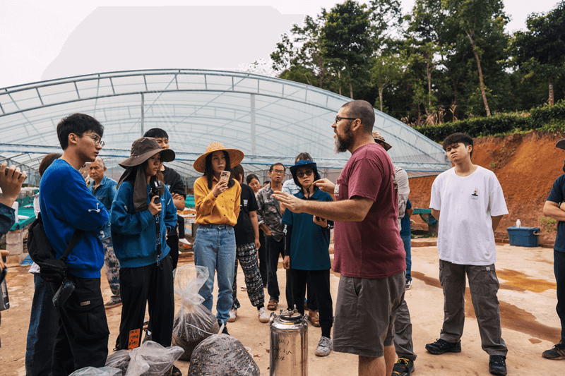 Torch Coffee’s Martin Pollack guiding a tour of specialty coffee enthusiasts at a coffee farm near Pu’er, Yunnan Province&nbsp;